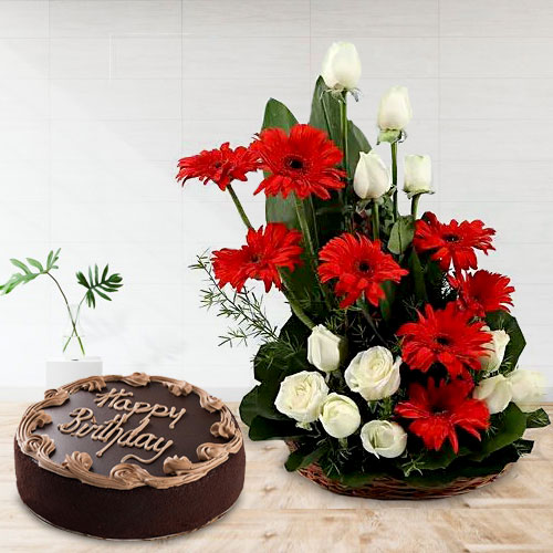 Birthday greetings with cake and flowers