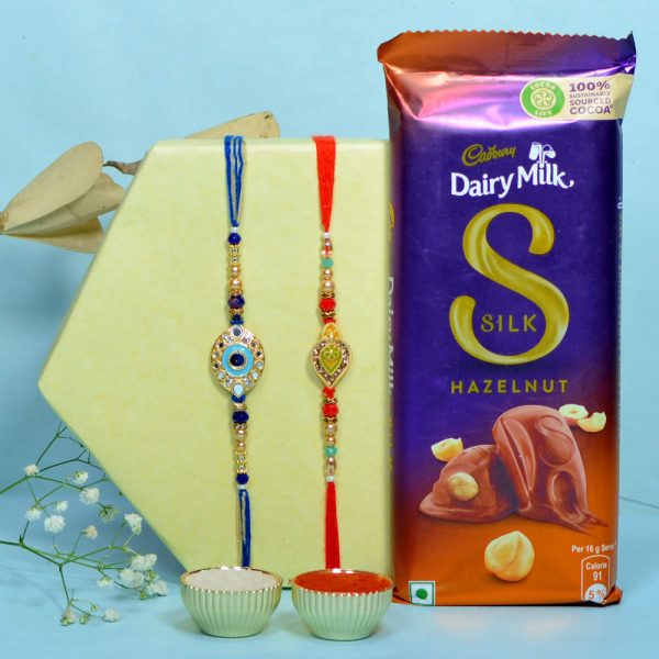 Golden Green N Golden Cyan Mirror Rakhi Duo Chocolate Hamper