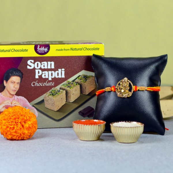 Bansuri Ganapati Rakhi with Chocolate Soan Papdi Hamper