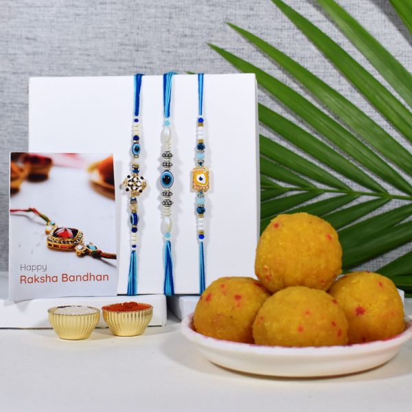 Designer Evil Eye Rakhi Set of 3 with Haldiram's Kesar Laddu